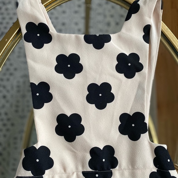 Cream and Black Floral Mini Dress with Cut out sides, sinch waist and skirt - Picture 2 of 7